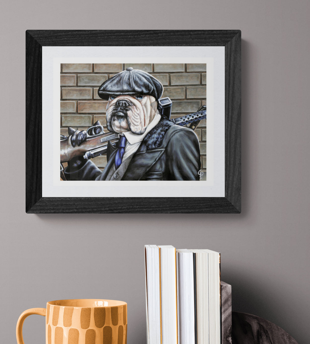 Framed artwork of a bulldog in a suit and cap holding a rifle against a brick wall.