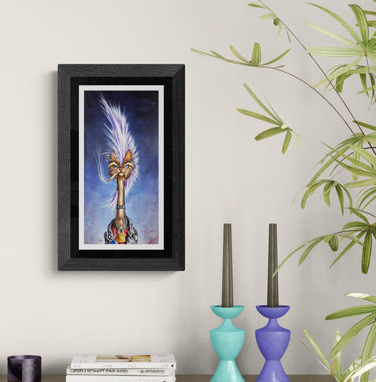 Framed artwork of a stylized cat with colorful feathers on a wall above two candle holders.