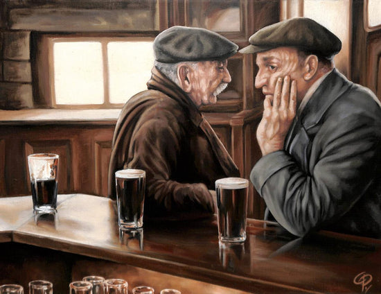 two men drinking guiness at a bar